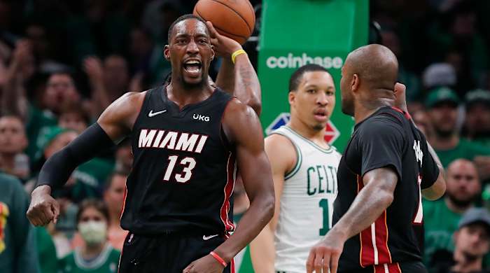 Miami Heat’s Bam Adebayo (13) celebrates after scoring against the Boston Celtics during the second half of Game 3 of the NBA basketball playoffs Eastern Conference finals Saturday, May 21, 2022, in Boston.